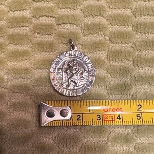 Sterling Silver Saint Christopher “Protect Us”
Medal